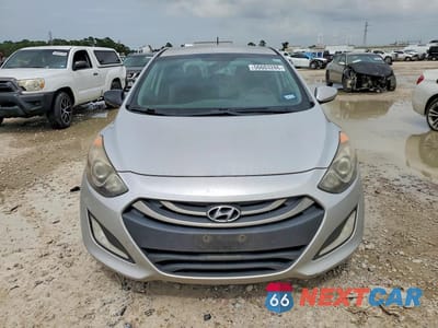 Piąte zdjęcie samochodu w środku: 2014 HYUNDAI ELANTRA GT BASE VIN:KMHD35LH8EU207397 - miniatura