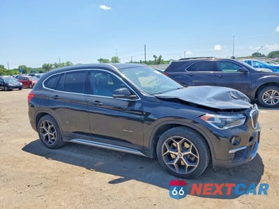 Czwarte zdjęcie samochodu z boku: 2016 BMW X1 XDRIVE28I VIN:WBXHT3C39G5E51769 - miniatura