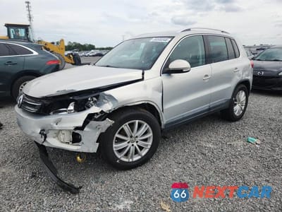2013 VOLKSWAGEN TIGUAN S WVGAV3AX5DW617248 - główne zdjęcie licytacji z USA - miniatura