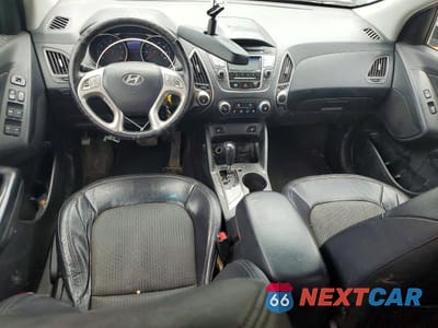 Zdjęcie 8 z 13 samochodu: 2013 HYUNDAI TUCSON GLS VIN:KM8JUCAC6DU755179 - miniatura