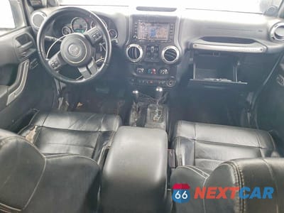 Zdjęcie 8 z 13 samochodu: 2012 JEEP WRANGLER UNLIMITED SAHARA VIN:1C4BJWEG7CL150012 - miniatura