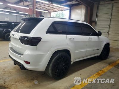 Trzecie zdjęcie samochodu z tyłu: 2014 JEEP GRAND CHEROKEE SRT-8 VIN:1C4RJFDJ9JC145080 - miniatura