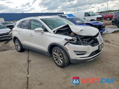Czwarte zdjęcie samochodu z boku: 2015 LINCOLN MKC VIN:5LMCJ2A94FUJ36421 - miniatura