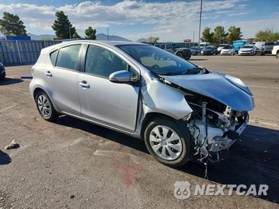 Czwarte zdjęcie samochodu z boku: 2014 TOYOTA PRIUS C TWO VIN:JTDKDTB39E1062729 - miniatura