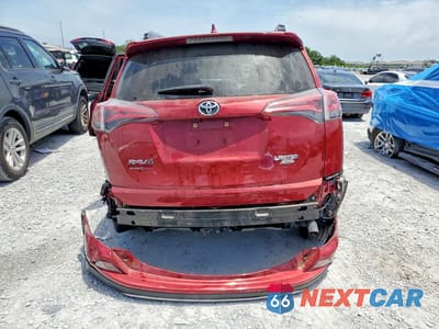 Zdjęcie 6 z 13 samochodu: 2018 TOYOTA RAV4 LIMITED VIN:JTMDFREV0JD242094 - miniatura