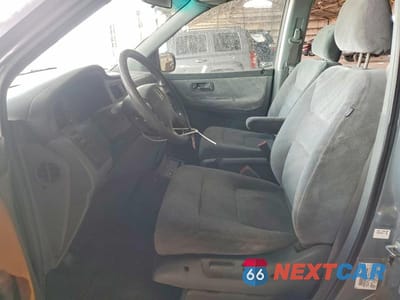 Zdjęcie 7 z 13 samochodu: 2002 HONDA ODYSSEY EX VIN:2HKRL18632H522043 - miniatura