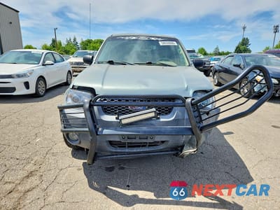 Piąte zdjęcie samochodu w środku: 2005 FORD ESCAPE XLT VIN:1FMYU93195KA74489 - miniatura