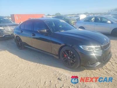 Czwarte zdjęcie samochodu z boku: 2021 BMW M340I VIN:3MW5U7J03M8B52056 - miniatura
