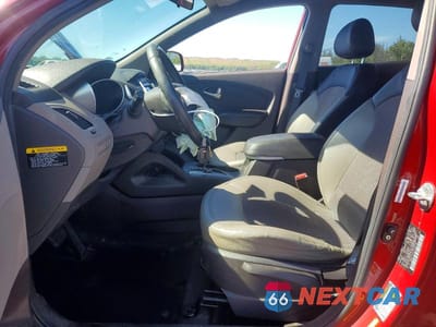 Zdjęcie 7 z 13 samochodu: 2012 HYUNDAI TUCSON GLS VIN:KM8JUCAC0CU456138 - miniatura