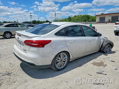 Trzecie zdjęcie samochodu z tyłu: 2015 FORD FOCUS TITANIUM VIN:1FADP3J24FL228725 - miniatura