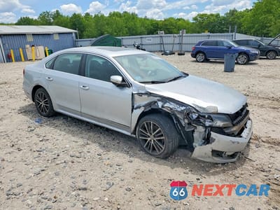 Czwarte zdjęcie samochodu z boku: 2015 VOLKSWAGEN PASSAT SE VIN:1VWBT7A30FC017449 - miniatura