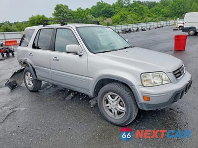 Czwarte zdjęcie samochodu z boku: 2001 HONDA CR-V SE VIN:JHLRD18751S002497 - miniatura