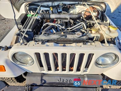 Zdjęcie 12 z 13 samochodu: 2003 JEEP WRANGLER / TJ SPORT VIN:1J4FA49S23P371332 - miniatura