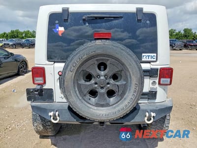 Zdjęcie 6 z 13 samochodu: 2014 JEEP WRANGLER UNLIMITED SAHARA VIN:1C4HJWEG9EL322926 - miniatura