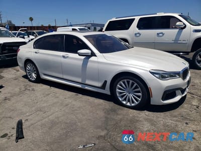 Czwarte zdjęcie samochodu z boku: 2017 BMW 750 XI VIN:WBA7F2C53HG421761 - miniatura