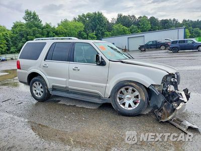 Czwarte zdjęcie samochodu z boku: 2003 LINCOLN NAVIGATOR VIN:5LMFU27R53LJ37977 - miniatura