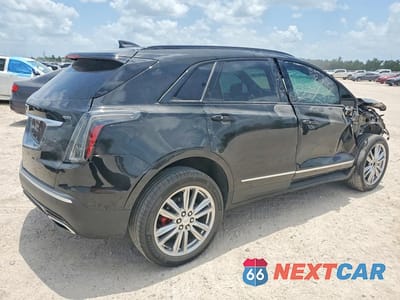 Trzecie zdjęcie samochodu z tyłu: 2023 CADILLAC XT5 SPORT VIN:1GYKNGRS3PZ137957 - miniatura