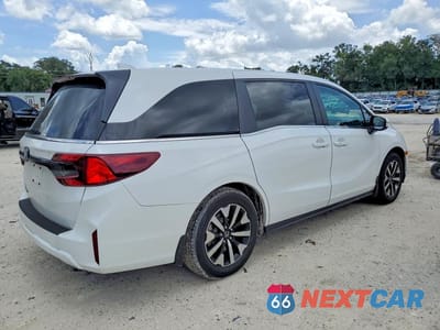 Trzecie zdjęcie samochodu z tyłu: 2026 HONDA ODYSSEY EXL VIN:5FNRL6H60TB041437 - miniatura