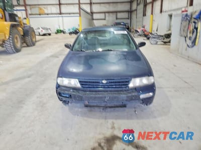 Piąte zdjęcie samochodu w środku: 1997 NISSAN ALTIMA XE VIN:1N4BU31D5VC139049 - miniatura