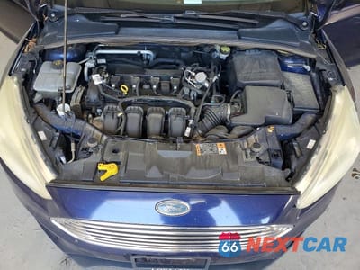 Zdjęcie 11 z 12 samochodu: 2016 FORD FOCUS TITANIUM VIN:1FADP3J26GL335759 - miniatura