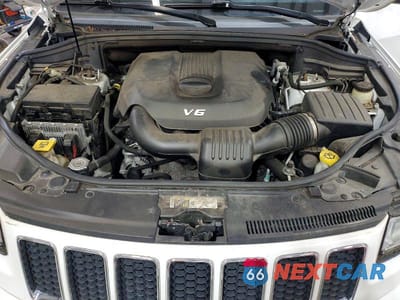 Zdjęcie 12 z 13 samochodu: 2014 JEEP GRAND CHEROKEE OVERLAND VIN:1C4RJFCG1EC395781 - miniatura