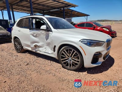 Czwarte zdjęcie samochodu z boku: 2020 BMW X5 SDRIVE 40I VIN:5UXCR4C00LLT19941 - miniatura