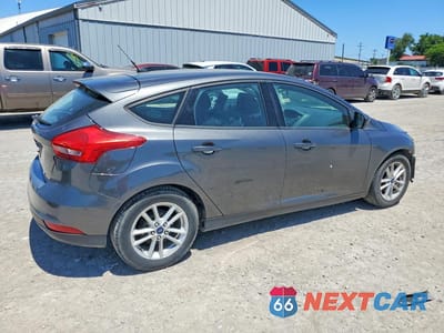 Trzecie zdjęcie samochodu z tyłu: 2018 FORD FOCUS VIN:1FADP3K28JL301585 - miniatura