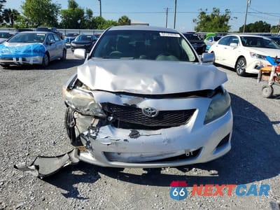 Piąte zdjęcie samochodu w środku: 2009 TOYOTA COROLLA LE VIN:JTDBL40E39J050059 - miniatura