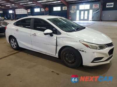Czwarte zdjęcie samochodu z boku: 2016 CHEVROLET CRUZE LS VIN:1G1BC5SM0G7285418 - miniatura