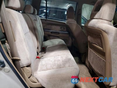 Zdjęcie 11 z 14 samochodu: 2003 HONDA PILOT EX VIN:2HKYF18413H606557 - miniatura