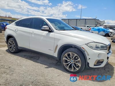 Czwarte zdjęcie samochodu z boku: 2019 BMW X6 SDRIVE35I VIN:5UXKU0C53K0H98843 - miniatura