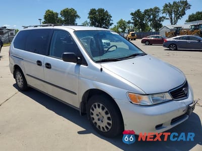 Czwarte zdjęcie samochodu z boku: 2001 HONDA ODYSSEY LX VIN:2HKRL18571H531091 - miniatura