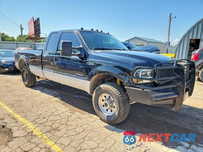 Czwarte zdjęcie samochodu z boku: 2000 FORD F250 SUPER DUTY VIN:1FTNX21F9YEC78202 - miniatura