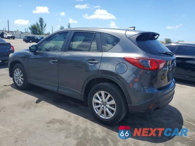 Drugie zdjęcie samochodu z przodu: 2016 MAZDA CX-5 TOURING VIN:JM3KE2CYXG0900641 - miniatura