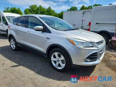Czwarte zdjęcie samochodu z boku: 2015 FORD ESCAPE SE VIN:1FMCU9G99FUA45073 - miniatura
