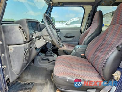 Zdjęcie 7 z 12 samochodu: 2000 JEEP WRANGLER / TJ SE VIN:1J4FA29P2YP771267 - miniatura