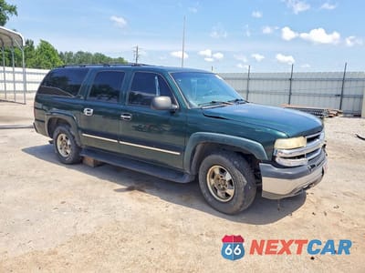 Czwarte zdjęcie samochodu z boku: 2001 CHEVROLET SUBURBAN K1500 VIN:3GNFK16T11G153244 - miniatura