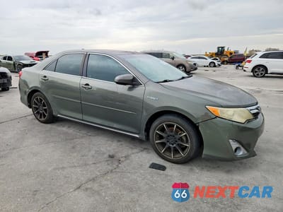 Czwarte zdjęcie samochodu z boku: 2012 TOYOTA CAMRY HYBRID XLE VIN:4T1BD1FK7CU034120 - miniatura