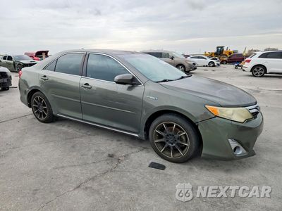 Czwarte zdjęcie samochodu z boku: 2012 TOYOTA CAMRY HYBRID XLE VIN:4T1BD1FK7CU034120 - miniatura