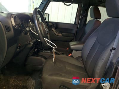 Zdjęcie 7 z 12 samochodu: 2016 JEEP WRANGLER SPORT VIN:1C4GJWAG9GL171025 - miniatura