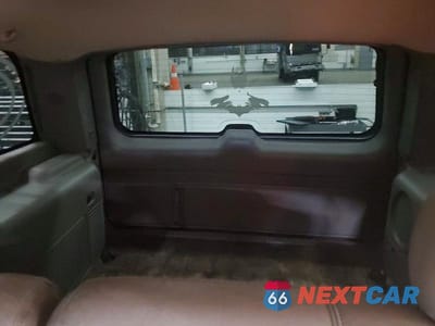 Zdjęcie 10 z 13 samochodu: 2001 CHEVROLET TAHOE K1500 VIN:1GNEK13T51J261218 - miniatura