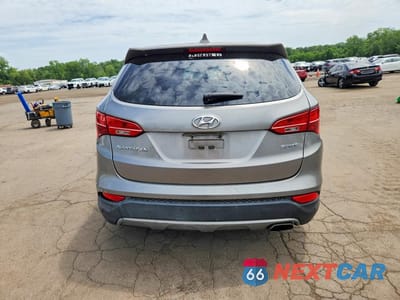 Zdjęcie 6 z 12 samochodu: 2013 HYUNDAI SANTA FE SPORT 2.4L VIN:5XYZT3LB6DG013638 - miniatura