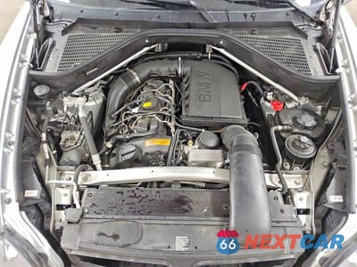 Zdjęcie 12 z 13 samochodu: 2013 BMW X5 XDRIVE35I VIN:5UXZV4C53D0E00908 - miniatura