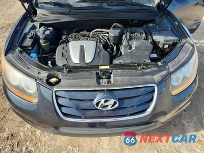 Zdjęcie 12 z 13 samochodu: 2011 HYUNDAI SANTA FE GLS VIN:5XYZG4AG5BG017329 - miniatura