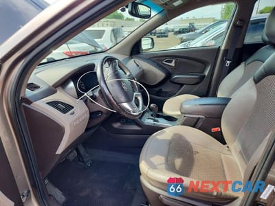 Zdjęcie 7 z 12 samochodu: 2012 HYUNDAI TUCSON GLS VIN:KM8JUCAC1CU415808 - miniatura