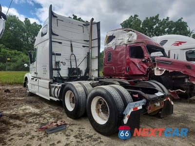 Trzecie zdjęcie samochodu z tyłu: 2012 VOLVO VNL SEMI TRUCK VIN:4V4NC9EJ2CN551139 - miniatura