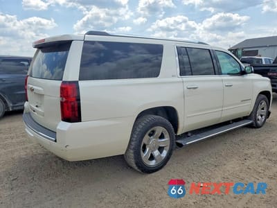 Trzecie zdjęcie samochodu z tyłu: 2015 CHEVROLET SUBURBAN K1500 LTZ VIN:1GNSKKKC2FR182320 - miniatura