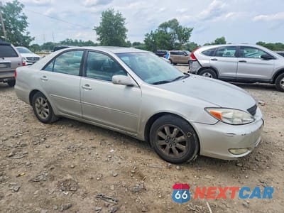 Czwarte zdjęcie samochodu z boku: 2003 TOYOTA CAMRY XLE VIN:4T1BE30K13U665365 - miniatura