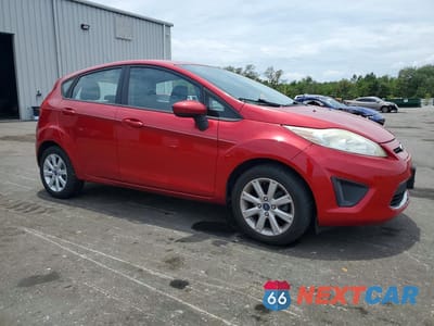 Czwarte zdjęcie samochodu z boku: 2011 FORD FIESTA SE VIN:3FADP4EJ8BM232325 - miniatura