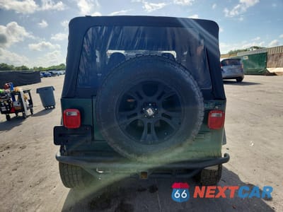 Zdjęcie 6 z 13 samochodu: 1999 JEEP WRANGLER / TJ SE VIN:1J4FY29P4XP460448 - miniatura